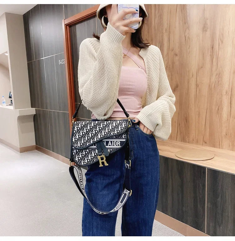 Bag women 2023 new retro women's bag single shoulder hand crossbody small bag fashion foreign underarm saddle bag
