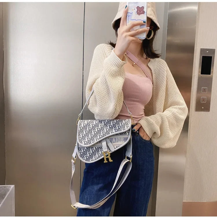 Bag women 2023 new retro women's bag single shoulder hand crossbody small bag fashion foreign underarm saddle bag