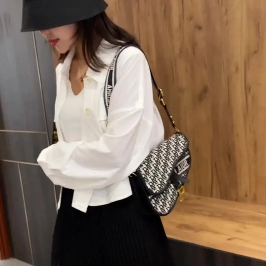 Bag women 2023 new retro women's bag single shoulder hand crossbody small bag fashion foreign underarm saddle bag